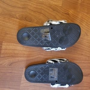 Brand New Black and White fuzzy faux fur slides.